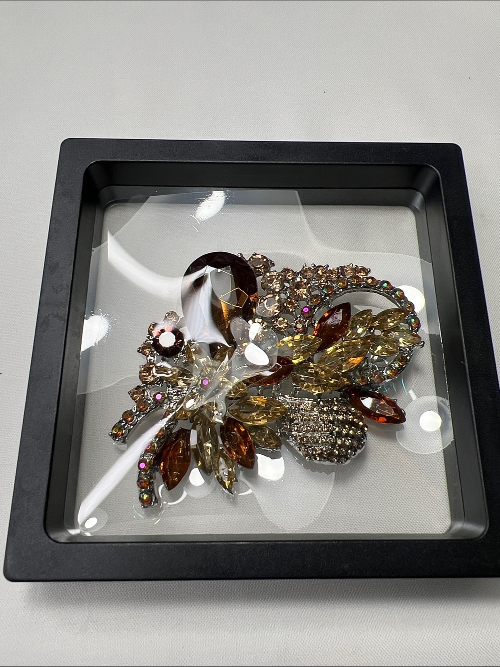 Vintage-Inspired Crystal Leaf Brooch in Amber and Gold Tones